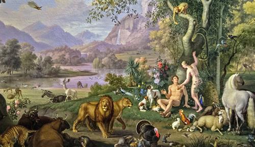 A painting showing Adam and Eve in an earthly paradise setting, with a river, mountains and a waterfall in the background, and trees in the foreground. Animals of all stripes fill the scene: lions, horses, chickens, turkeys, pelicans, parrots, deer, camels, dogs, cats, tigers and more. Adam and Eve, naked, are under a tree. Eve is offering an apple to Adam as a snake in the tree looks on.