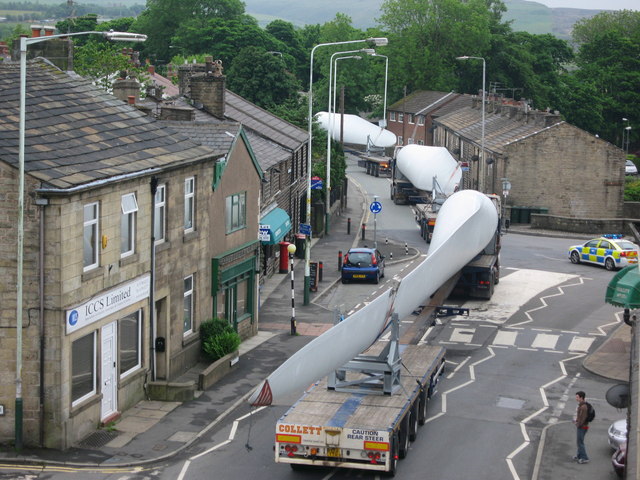 Trucks transport pieces of a turbine.